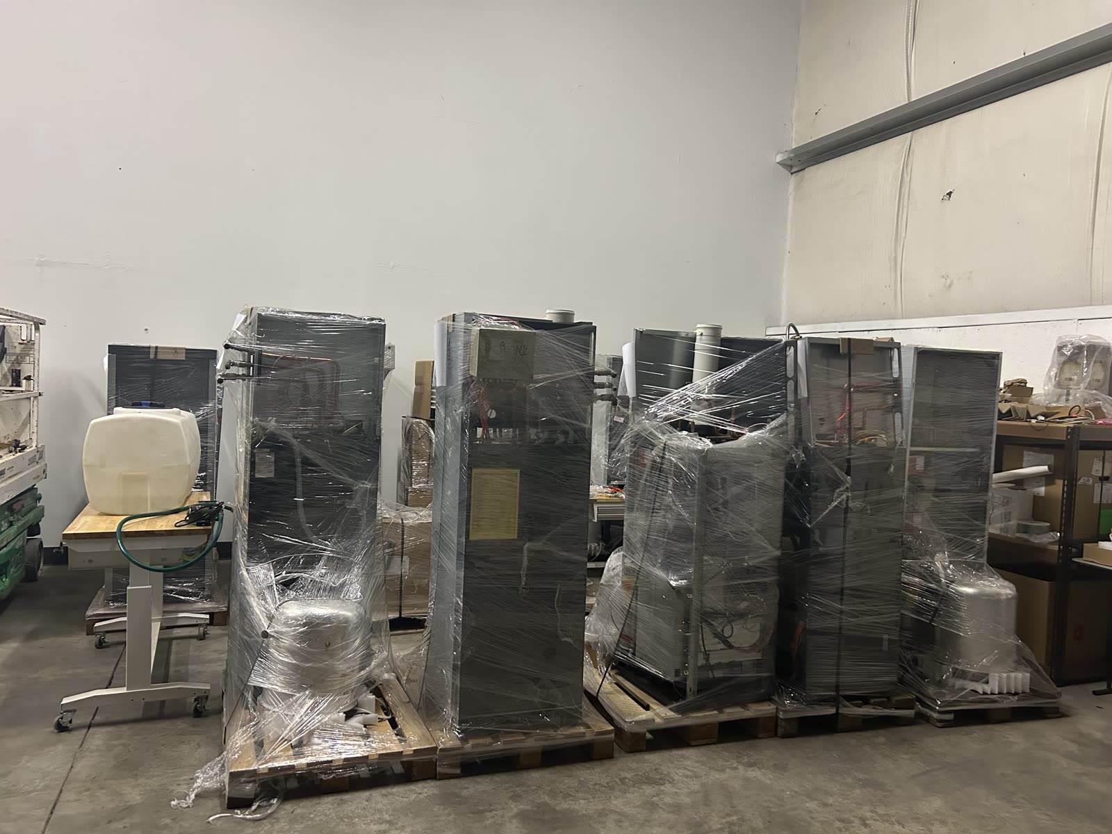 Flux Home units shrink-wrapped on pallets in the warehouse, ready for shipment